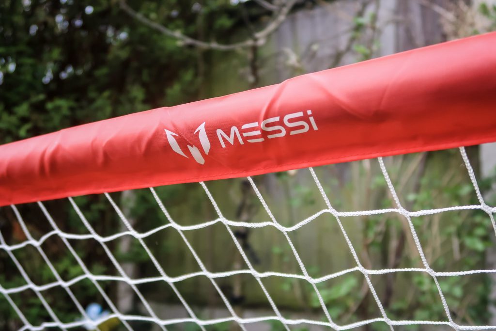 A close up of the Messi logo on the foldable goal