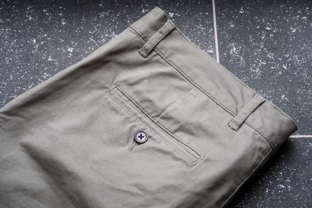 The back pocket of the Flat Front Wrinkle Free Stretch Chino Trousers