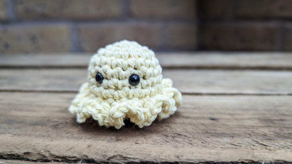 Finished tiny octopus - free crochet pattern