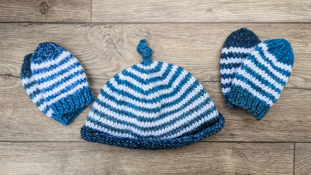 knitted baby hat and mittens